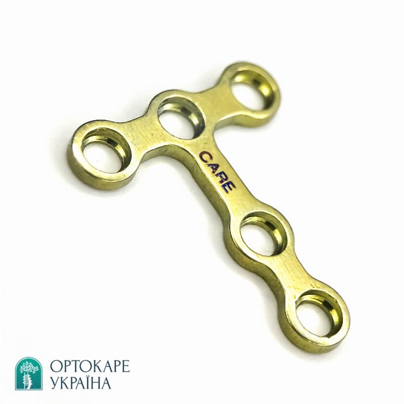 Т-подібна пластина з 5 отворами 90°, перемичка 12 мм, товщина 1,0 мм